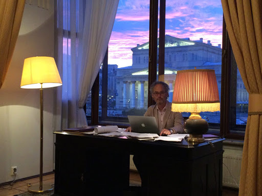 literary author Amor Towles sitting in a desk at the Metropol Hotel in Moscow, Russia