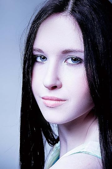Royalty-Free photo: Close-up of a woman wearing white top against grey background | PickPik