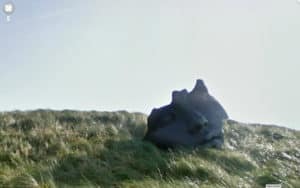 Google Street View photograph of broken head statue