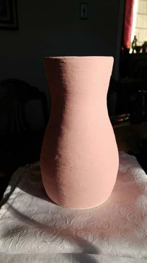 glazed, unfired raku pottery vase red