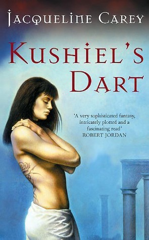 The cover of Kushiel's Dart shows a dark haired woman, topless and hugging herself. the background is a misty, far off ruined arch