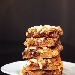 stack of nutella magic bars on a white plate