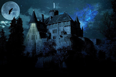Haunted castle under the cover of a full moon
