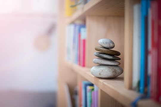 stone cairn on a bookshelf<br />