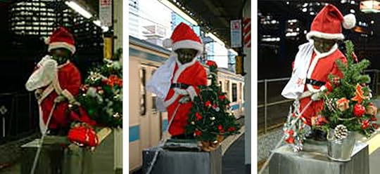 The nude peeing boy statue at JR Hamamatsucho station dressed as Santa in the years 2000, 2001, 2002