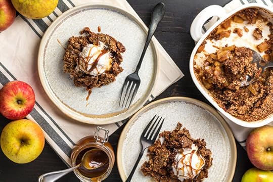 two servings of paleo apple dump cake on plates 