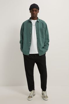 Relaxed Fit Overshirt With Lapel Collar And Long Sleeves With Buttoned Cuffs. Chest Patch Pocket. Washed Effect. Front Button Closure.