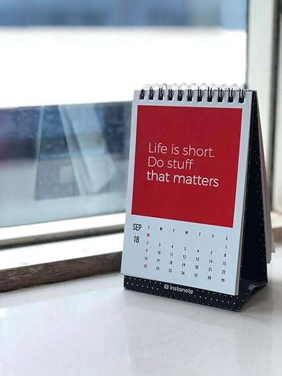 spiral freestanding calendar on white surface