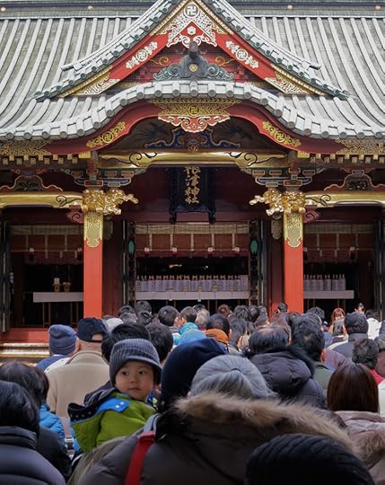 People waiting for hatsumode first shrine visit of the new year at the Nezu Shrine in Tokyo