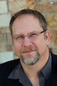 Author Photo of Travis Heermann.