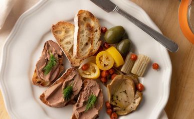 duck liver pate on toast with pickled accompaniments