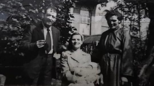 Baby Anna with her parents and her Godmother on her Christening day