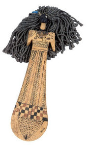 One of the big-haired paddle dolls with emphasized vulva