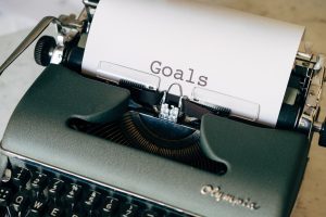 old typewriter with a piece of paper in it with 