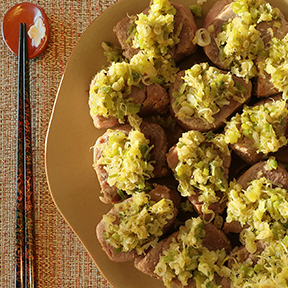 Marinated pork medallions with melted leeks