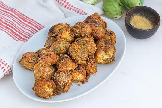 Nutritional Yeast & Tahini Coated Brussles Sprouts Served on a White Platter