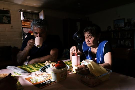 San Bernardo, Santiago, Chile, 2020. Paula Lorca’s parents, Ramón and Maria, drink coffee with the family.