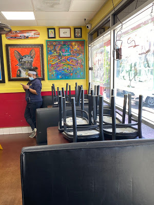 customer waits inside Los Tito's in La Mesa, California