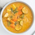 White Bowl of Veggie-packed Leek Potato Soup