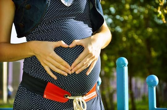 Utero in affitto: una donna incinta, dettaglio.