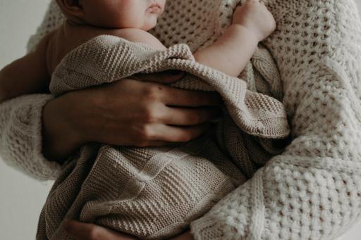 Woman holding a baby