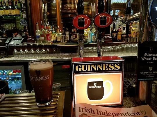 The black stuff settling, time to read the news. The main bar at The Stag's Head.