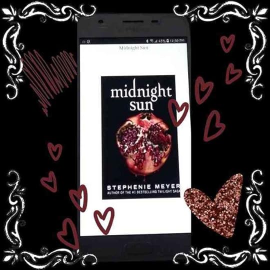 Midnight Sun cover on a cell phone, set amidst heart pictures and a floral border.The cover shows a halved pomegranate on black.