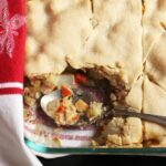 spoon in dish of pot pie