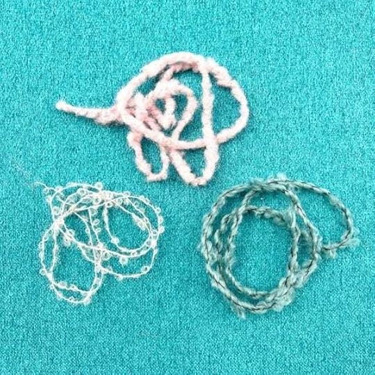 Different styles of boucle yarn.