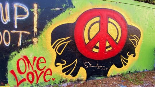 wall art about anti racism showing peace and one love
