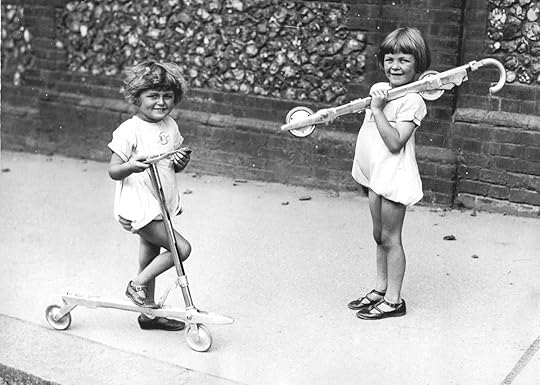 Two girls with scooters public domain Australia