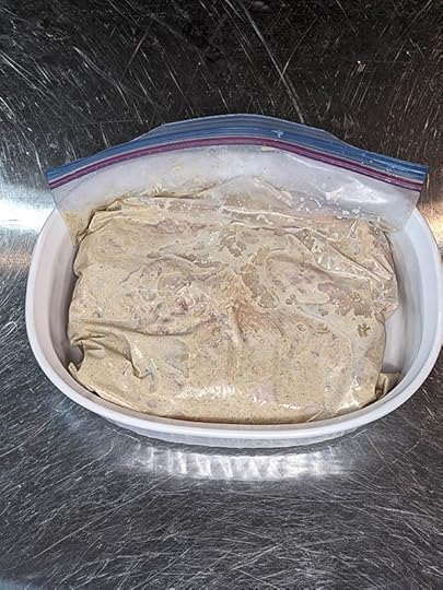 chicken marinating in a yogurt marinade