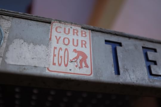 curb your ego sign