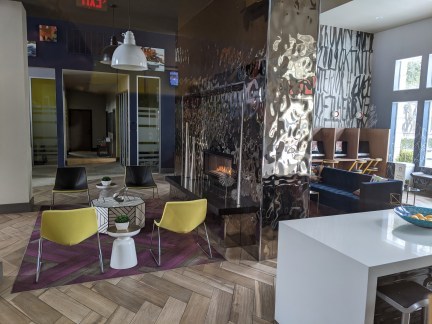 Common Room at my Apartment, Locked, with a Fireplace Roaring