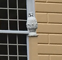 stone pineapple on a building