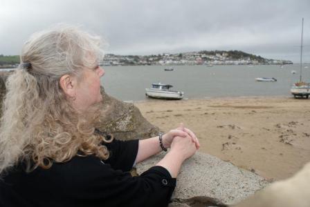 Photo of Helen looking out to sea at Instow harbour