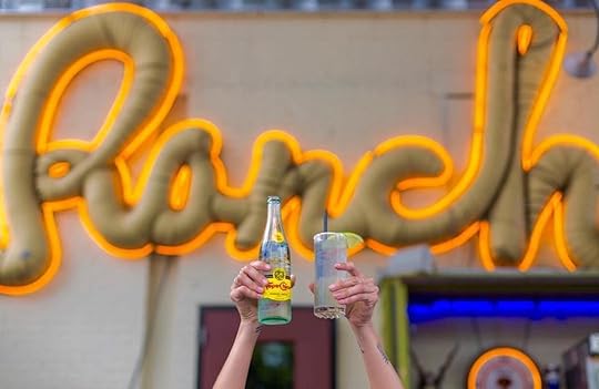Two glasses held up in the air