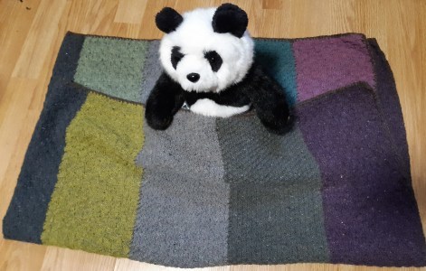 photo of lockdown blanket with toy panda