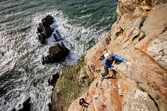 Tom climbing Book of Ages E5 6b at Gogarth. Photo: Dan Lane