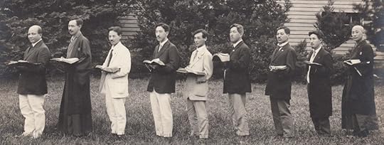 Juji Nakada and Japanese Bible students holding Bibles