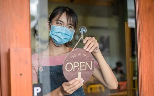 woman wearing mask in store