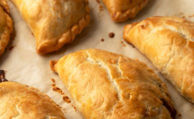Finished pasty recipe, with pasties cooling on parchment paper
