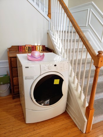 broken dryer in the entryway