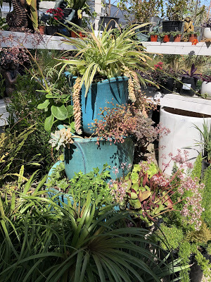 3 turquoise pots stacked