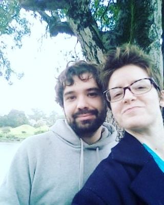 May be an image of 2 people, outdoors and tree