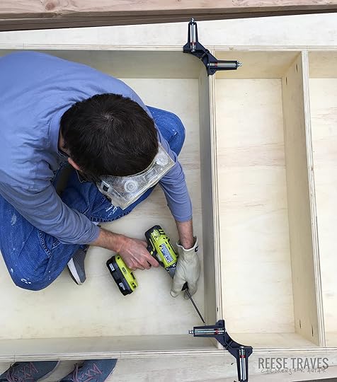 Using pocket screws to join corners of plywood bookcase.