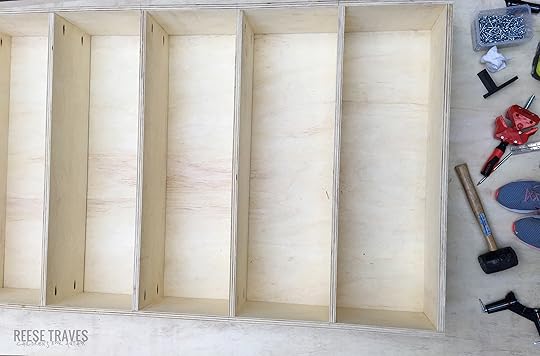 First completed bookcase out of 7 total for a DIY built-in bookshelves project that has a hidden door too!