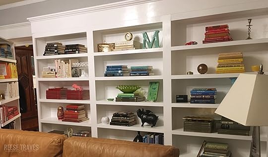 Side 2 of bookshelves with a hidden bookshelf door.
