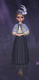 Jo in a flowy black skirt, white blouse, and gray wrap with floral accents