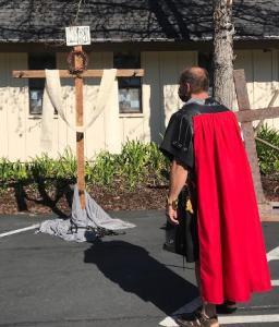 Holy Week walk to a Roman soldier at the cross